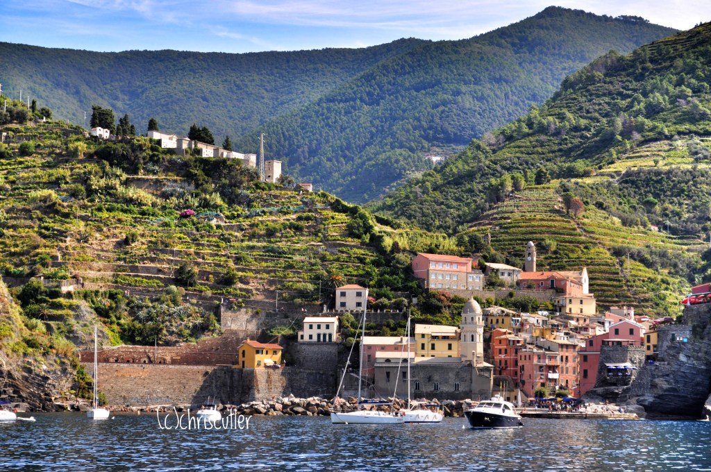 Village framed by the sea and terraced hills